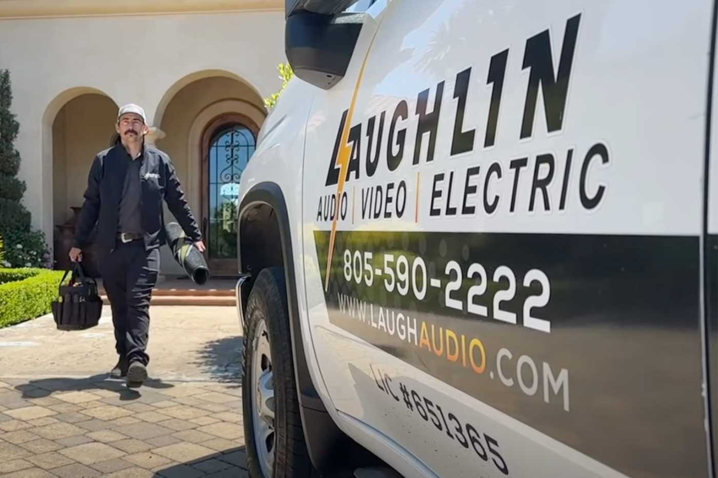 A Laughlin Electric Santa Barbara truck with technicians ready to complete septic tank repair in Santa Barbara, CA.